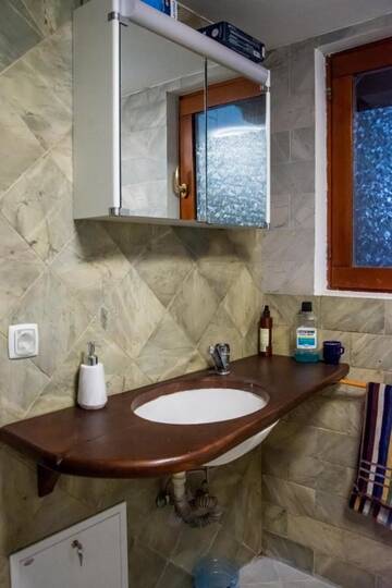 Фото номера Дом с 4 спальнями Дома для отпуска Cabana din Dealul Cucului г. Năsăud 12