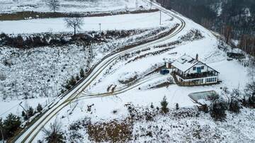 Фото номера Дом с 4 спальнями Дома для отпуска Cabana din Dealul Cucului г. Năsăud 14