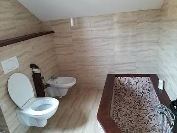 Фото номера Дом с 4 спальнями Дома для отпуска Cabana din Dealul Cucului г. Năsăud 38