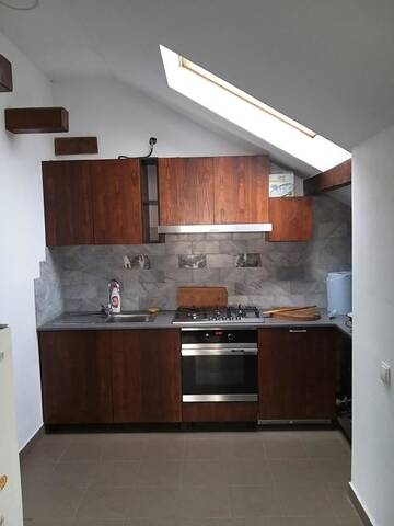 Фото номера Дом с 4 спальнями Дома для отпуска Cabana din Dealul Cucului г. Năsăud 34